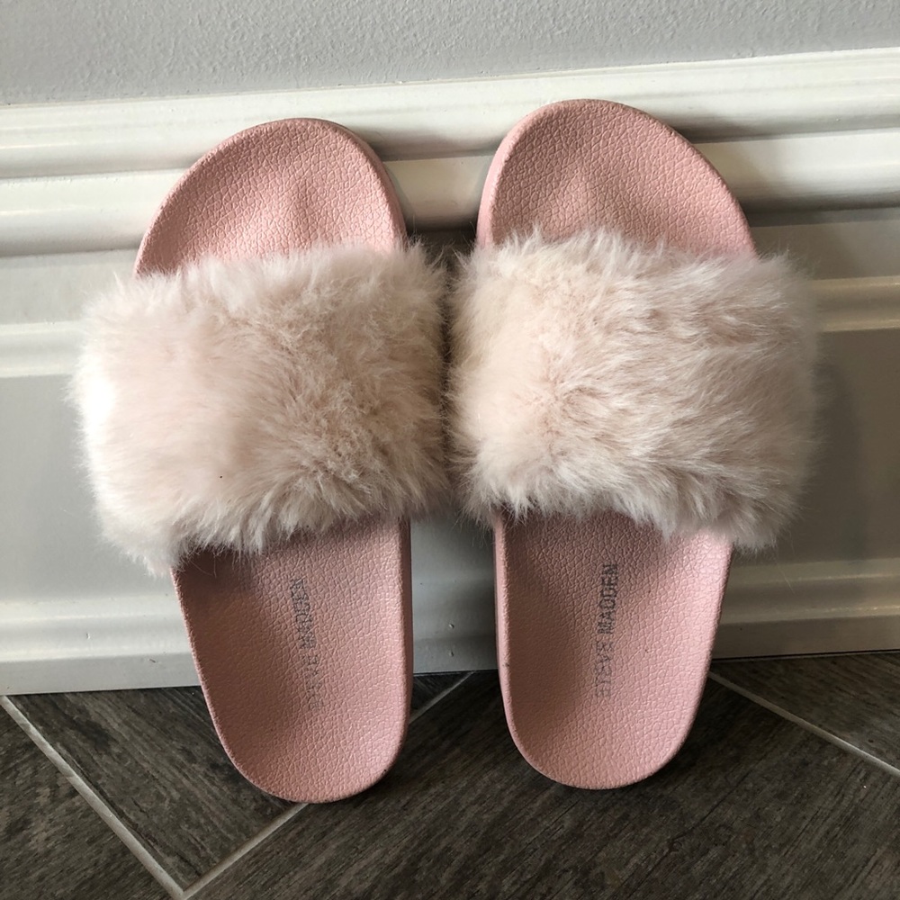 Pink, fluffy Steve Madden slides.